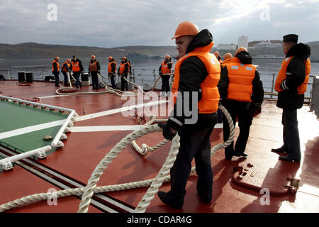 Sep 12, 2010-Severomorsk, Russia- The heavy nuclear missile cruiser of the Northern Fleet 'Peter Velikiy'( Peter the Great) returned to the main base of the Northern Fleet, Severomorsk on Sunday after a long voyage, which lasted six months. In a solemn meeting of the cruiser took part: the commander Stock Photo