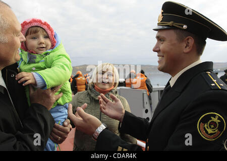 Sep 12, 2010-Severomorsk, Russia- The heavy nuclear missile cruiser of the Northern Fleet 'Peter Velikiy'( Peter the Great) returned to the main base of the Northern Fleet, Severomorsk on Sunday after a long voyage, which lasted six months. In a solemn meeting of the cruiser took part: the commander Stock Photo