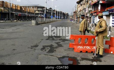 Indian security forces stand guard during the annual festival dedicated ...