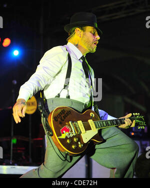 Jan. 24, 2011 - Bakersfield, California - U.S.  - Social Distortion led by MIKE NESS perform at the Kern County Fairgrounds Monday. Performing with Ness are JONNY WICKERSHAM on guiter, bassist BRETT HARDING and DAVE HIDALGO JR on drums. (Credit Image: Alan Greth/ZUMAPress.com) Stock Photo