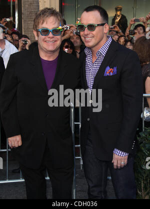 Jan. 23, 2011 - Hollywood, California, U.S. - ELTON JOHN & DAVID FURNISH arrives for the premiere of the film 'Gnomeo & Juliet' at the El Capitan theater. (Credit Image: © Lisa O'Connor/ZUMAPRESS.com) Stock Photo