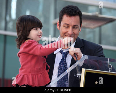 Feb. 1, 2011 - Hollywood, California, U.S. - Adam Sandler & daughter Sunny as the Walk of Fame Ceremony for Adam Sandler. (Credit Image: © Lisa O'Connor/ZUMAPRESS.com) Stock Photo