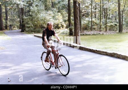 Feb. 7, 2011 - Camp David, MARYLAND, U.S. - (FILE) A file picture dated 12 September 1978 shows US President Jimmy Carter riding his bicycle on the grounds of Camp David, Maryland, USA. (Credit Image: © Carter Archives/ZUMAPRESS.com) Stock Photo