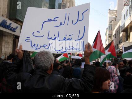 Feb 17, 2011 - Ramallah, West Bank, Palestinian Territories - Palestinians take part in a rally calling for ending the Palestinian division, in the West Bank city of Ramallah. More than 3000 protesters call for free elections and the reconciliation between the two rival factions of Fatah and Hamas.  Stock Photo