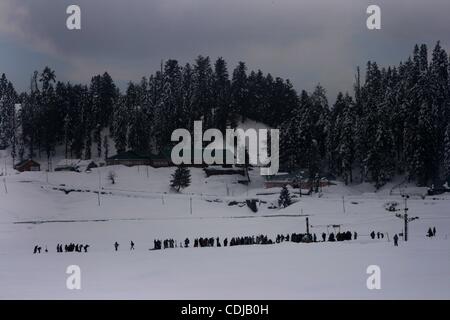 Feb 22, 2011 - Gulmarg Valley, Kashmir, India - People enjoy the snow covered mountains, about 55 kilometers from Srinagar. (Credit Image: &#169; Altaf Zargar/ZUMAPRESS.com) Stock Photo