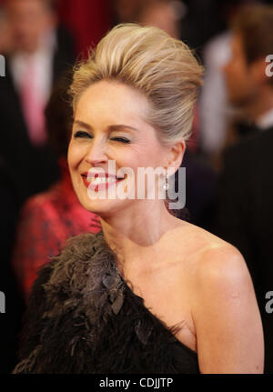 Feb. 27, 2011 - Hollywood, California, U.S. - Actress SHARON STONE winks while wearing a Christian Dior gown on the Oscar red carpet at the 83rd Academy Awards, The Oscars, in front of Kodak Theatre. (Credit Image: © Lisa O'Connor/ZUMAPRESS.com) Stock Photo