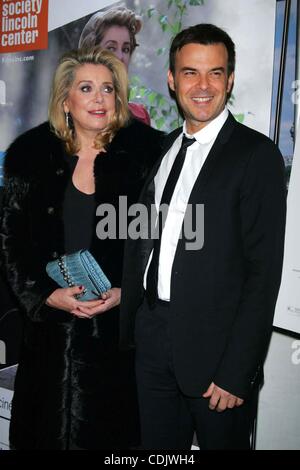 Mar. 3, 2011 - New York, New York, U.S. - CATHERINE DENEUVE AND FRANCOIS OZON arrive for the Opening Night of Rendez-Vous with French Cinema Premiere of ''Potiche'' at the Paris Theater in New York on March 3, 2011. ... K67730SN(Credit Image: © Sharon Neetles/Globe Photos/ZUMAPRESS.com) Stock Photo