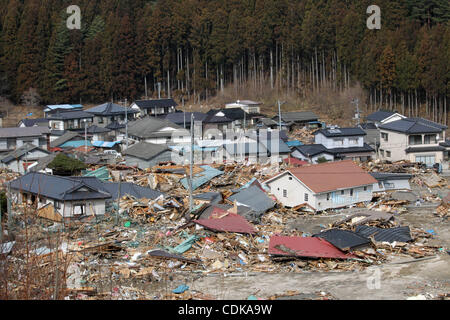Mar. 14, 2011 - Kamaishi, Japan - Collapsed houses are seen in Kamaichi, Iwate, Japan. Magnitude 9.0 earthquake hit Northern Japan. Several tens of thousands of people are still missing. (Credit Image: © Junko Kimura/Jana Press/ZUMAPRESS.com) Stock Photo