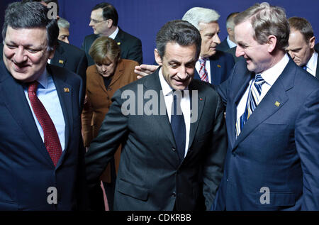 Mar. 24, 2011 - Brussels, BXL, Belgium - President of the European Commission Jose Manuel Barroso (L),  French President Nicolas Sarkozy   (C) and   Irish Prime Minister Enda Kenny prior to the family photo during an European Union leaders summit    in  Brussels, Belgium on 2011-03-24 Union leaders  Stock Photo