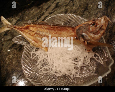 Mar 29, 2011 - Oceanside, California, U.S. - Types of sushi. A fried Spanish Mackerel carcass. The head and bones of the fish are fried up to eat after the meat is cut from the fish, also know as Aji, which is served raw sashimi style. The only thing you shouldn't eat are the fins and tail. The mout Stock Photo