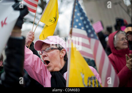 Mar. 31, 2011 - Washington, District of Columbia, U.S. - Members of the Tea Party Patriots hold a ''Continuing Revolution'' rally at the Robert A. Taft Memorial near the U.S. Capitol in Washington. (Credit Image: © Pete Marovich/ZUMAPRESS.com) Stock Photo