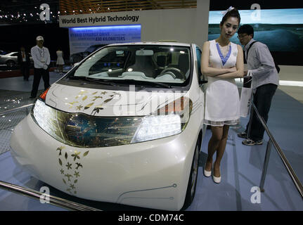 Apr 1, 2011 - Goyang, South Korea - A model next to a hybrid vehicle Toyota Co. during public day at the Seoul Motor Show in Goyang. (Credit Image: &#169; Dong-Min Jang/ZUMAPRESS.com) Stock Photo
