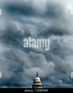 Apr. 12, 2011 - Washington, District of Columbia, U.S. - Storm clouds over hang over the dome of the U.S. Capitol building in Washington, D.C. (Credit Image: © Pete Marovich/ZUMAPRESS.com) Stock Photo