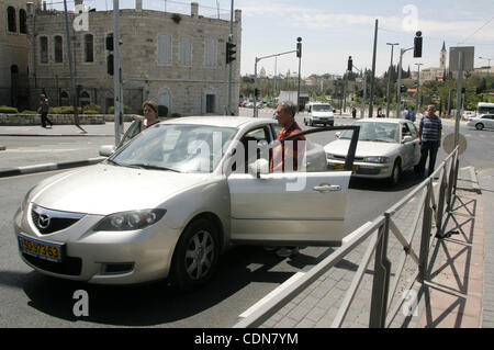 May 09, 2011 - Jerusalem, Israel - Israelis observe two minutes of silence as a siren wails across the country marking Remembrance Day for the fallen soldiers, in east Jerusalem. Remembrance Day is followed immediately by the 63rd anniversary of the creation of Israel in 1948 according to the Jewish Stock Photo