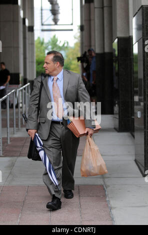 June 27, 2011 - Orlando, Florida, U.S. - Prosecutor FRANK GEORGE walks to the entrance of the Orange County Courthouse during the Casey Anthony murder trial. Casey Anthony is charged with killing her two-year-old daughter Caylee in 2008. (Credit Image: &#169; Phelan Ebenhack/ZUMAPRESS.com) Stock Photo