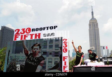 July 4, 2011 - New York City, U.S. - Japanese hot dog eating champion TAKERU KOBAYASHI after setting a record by eating 69 frankfurters in 10 minutes on the 230 Fifth Avenue Rooftop Bar! Kobayashi competed against Nathan's Famous International Hot Dog Contest contestants via live satellite feed from Stock Photo