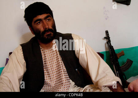 Apr 25, 2011 - Naw Zad, Helmand, Afghanistan - Naw Zad district Afghan National Police Chief ABDULLAH FARIDI, from the village of Surkano in the area sits in his office during a meeting with correspondents and U.S. Marines at the police headquarters in the town of Naw Zad in the Naw Zad district of 