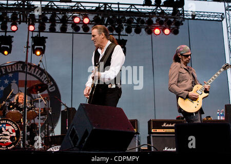 7/2/2011 - Del Mar, CA USA - Guitarist BRUCE KULICK (right), singer/guitarist MAX CARL (center) and drummer DON BREWER (left) perform with Grand Funk Railroad at the San Diego County Fair in Del Mar. Playing such hits as Foot Stompin' Music, I'm Your Captain (Closer To Home), and American Band, the  Stock Photo