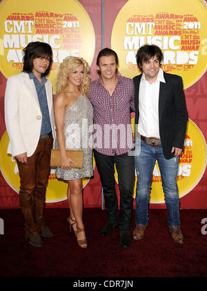 Jun 8, 2011 - Nashville, Tennessee; USA -  Musicians THE BAND PERRY along with Indy 500 Winner DAN WHELDON arrives on the red carpet at the 2011 CMT Music Awards that took place at the Bridgestone Arena located in downtown Nashville.  Copyright 2011 Jason Moore. (Credit Image: © Jason Moore/ZUMAPRES Stock Photo