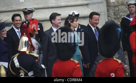 April 29, 2011 - London, England, UK - All leaders of the 3 largest UK political parties, (R-L) Prime Minister David Cameron and wife Samantha, Nick Clegg and wife Miriam, and Ed Miliband and partner Justine Thornton, share a laugh upon exiting Westminster Abbey at the conclusion of Prince William a Stock Photo