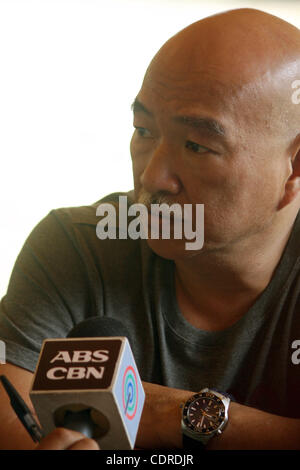 Apr 23, 2011 - Pantukan, Compostella Valley, Philippines - ARTHURO UY, governor of Compostella Valley in the southern Philippines, speaks before reporters Saturday in the township of Pantukan. Rescuers continue the search for people missing Saturday after an avalanche of mud buried an illegal gold m Stock Photo