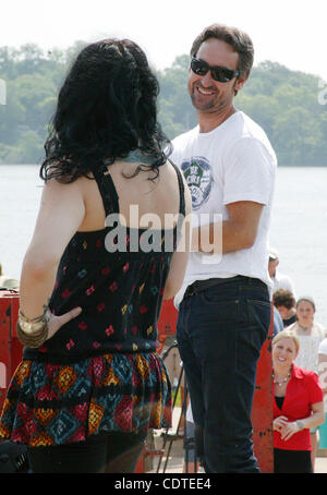 Danielle Colby Cushman, left and Mike Wolfe, two of the three stars on The History Channel's 'American Pickers,' answer questions from the audience Saturday June 4, 2011 during the 'American Pickers' Weekend that brought an estimated 10,000 people to LeClaire, Iowa. Co-star Frank Fritz did not atten Stock Photo