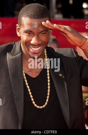 New York Knicks Amar'e Stoudemire stands on the court when play stops ...