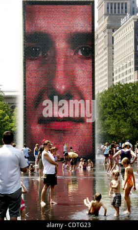 The Crown Fountain photographed on Sunday July 17, 2011 is an interactive work of public art and video sculpture featured in Chicago's Millennium Park, which is located in the Loop community area. Designed by Catalan artist Jaume Plensa, it opened in July 2004. (Kevin E. Schmidt/Maquoketa Studios) Stock Photo