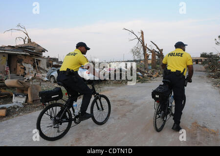 Apr 29, 2011 - Tuscaloosa, Alabama, U.S. - Montgomery County police officers patrol on bike the devastated community  of Forest Lake in Tuscaloosa, enforcing the curfew and watching for looters on Friday (Credit Image: © Dana Mixer/ZUMApress.com) Stock Photo