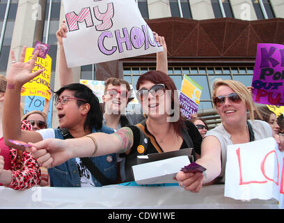 May 12, 2011 - Ottawa, Ontario, Canada - Pro Choice demonstrators giving out condoms to the Pro Life demonstrators during the 14th annual March for Life rally to protest Canada's abortion laws. (Credit Image: © Kamal Sellehuddin/ZUMAPRESS.com) Stock Photo