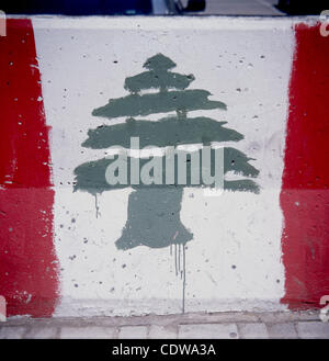 June 17, 2011 - Beirut, Lebanon - Lebanese flag adorns construction site fencing near the National Museum, south Beirut. Morphogenesis of the Green Line / Lebanese Civil War 1975-1991.'' In Beirut the destruction took twenty one years, sixteen years of war plus five of demolition, and the reconstruc Stock Photo