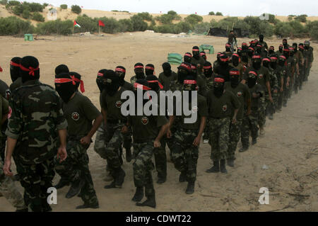 Militants of the Democratic Front for Liberation Palestine (DFLP) train during a military graduation ceremony in Rafah, southern Gaza Strip, on July 29, 2011. Photo by Abed Rahim Khatib Stock Photo