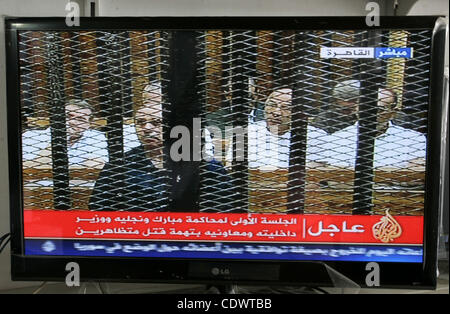 Former Egyptian President Hosni Mubarak's sons are seen in the still image taken from video on Aug. 3, 2011 in the courtroom at the Police Academy in Cairo, Egypt. Former Egyptian President Hosni Mubarak's trial started Wednesday in Cairo's Police Academy. Photo by Ashraf Amra Stock Photo