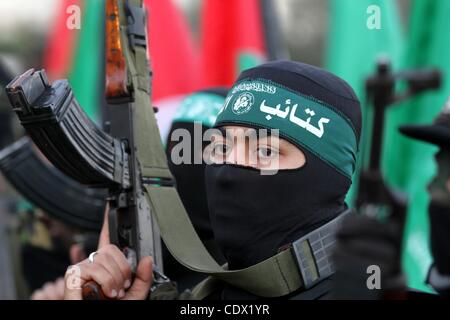 Oct. 19, 2011 - Gaza City, Gaza Strip, Palestinian Territory - Palestinian Hamas militants stand guard outside the tent erected to welcome Palestinian prisoners released in exchange for the captured Israeli soldier Gilad Schalit. (Credit Image: © Majdi Fathi  Apaimages/APA Images/ZUMAPRESS.com) Stock Photo