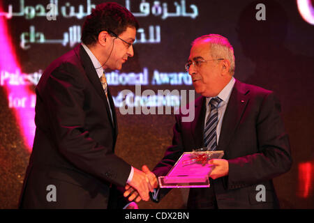 Oct. 24, 2011 - Nablus, West Bank, Palestinian Territory - Palestinian Prime Minister Salam Fayyad Recognizes the Palestine International Award for Award and creativity of the Turkish Consul General representing the Turkish Prime Minister Recep Tayyip Erdogan in Nablus city, Oct. 24. 2011. Photo by  Stock Photo