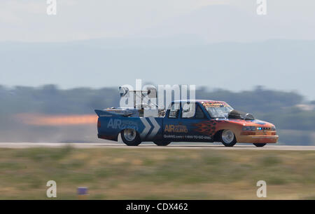 Aug. 27, 2011 - Denver, Colorado, U.S. - Flash Fire Jet Truck driven by NEAL DARNELL races a plane during the Rocky Mountain Airshow in Broomfield. (Credit Image: &#169; Hector Acevedo/ZUMAPRESS.com) Stock Photo