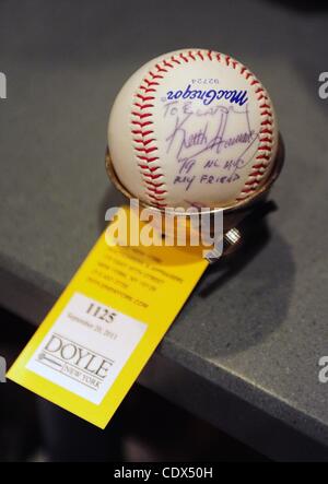 Sept. 20, 2011 - Manhattan, New York, U.S. - A baseball inscribed to Elaine Kaufman and signed by NY Mets' players Keith Hernandez and Gary Carter up for auction Doyle New York Auctioneers & Appraisers hosts the auction of the estate of Elaine Kaufman, famed restauranteur of Elaine's on Second Avenu Stock Photo