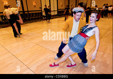 July 22, 2011 - Los Angeles, California, USA -  Couples use the practice dance floor prior to the Lindy Hop preliminaries on the first night of 'Camp Hollywood' and the National Jitterbug Championships. Stock Photo