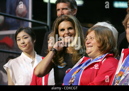 Yuna Kim (L), Olympics Gold Medalist in figure skating and Special Olympics Global Ambassador and Maria Shriver (center), daughter of Special Olympics founder Eunice Kennedy Shriver, at a news conference to announce that Los Angeles will host the 2015 Special Olympics World Summer Games, at Staples  Stock Photo