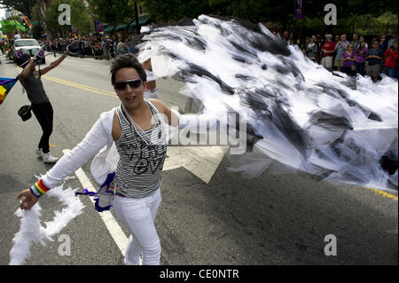 Oct. 9, 2011 - Atlanta, GA - A gay Latino dancer marches in Atlanta's Gay Pride Parade, one of the largest in the U.S.. The parade coincides with National Coming Out Day celebrations. Thousands gathered at Piedmont Park in the city's predominately gay midtown for the festival. Atlanta is in the top  Stock Photo