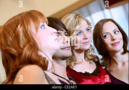 Annika Ernst, Marcus Schenkenberg, Jessica Ginkel, Janina Flieger at a photocall on the set of German ZDF-TV show 'Lena'. Huerth, Germany – 24.11.2010 Stock Photo