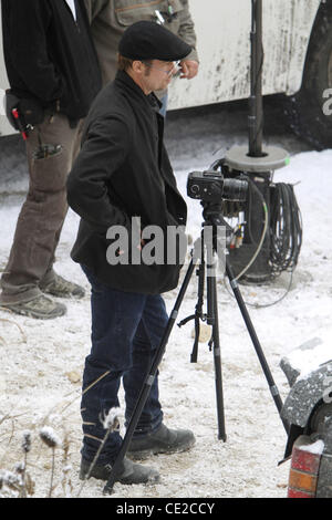 Brad Pitt taking photos on the set of Angelina Jolie's directorial debut 'United Love Story'. Budapest, Hungary - 08.11.2010 Stock Photo