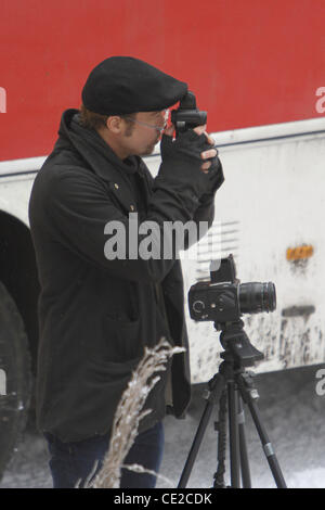 Brad Pitt taking photos on the set of Angelina Jolie's directorial debut 'United Love Story'. Budapest, Hungary - 08.11.2010 Stock Photo