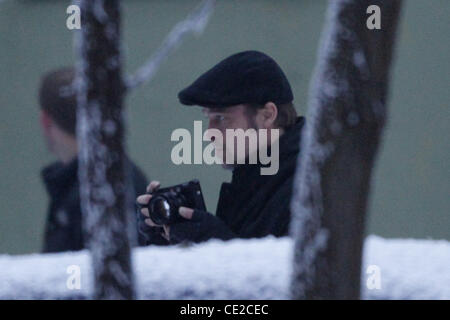 Brad Pitt taking photos on the set of Angelina Jolie's directorial debut 'United Love Story'. Budapest, Hungary - 08.11.2010 Stock Photo