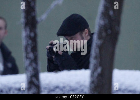 Brad Pitt taking photos on the set of Angelina Jolie's directorial debut 'United Love Story'. Budapest, Hungary - 08.11.2010 Stock Photo