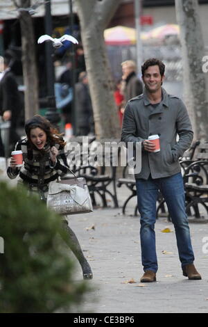 Leighton Meester and Penn Badgley are attacked by a pigeon while filming on location on the set of 'Gossip Girl'  New York City, USA - 22.10.10 Stock Photo