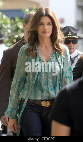 Cindy Crawford  makes an appearance on the entertainment TV show 'Extra' with host Mario Lopez at the Grove  Los Angeles, California - 25.10.10 Stock Photo