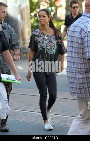 Brooke Burke films an interview for the entertainment television news ...