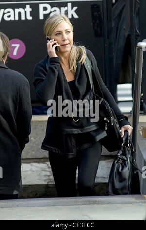 Jennifer Aniston talking on a cell phone on the set of her new film ...