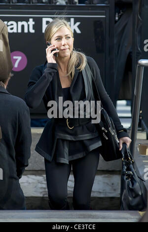 Jennifer Aniston talking on a cell phone on the set of her new film ...